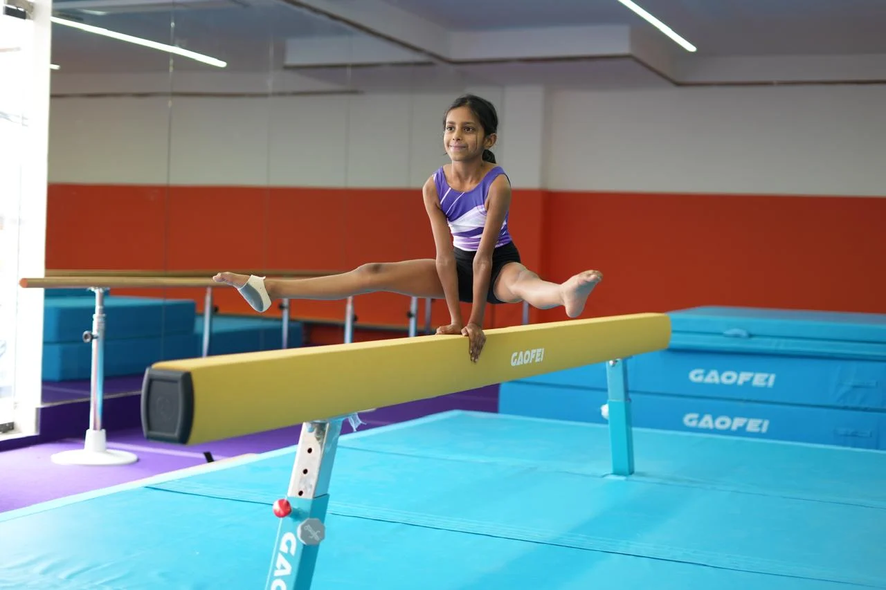 Young athlete building physical strength and life skills through gymnastics.